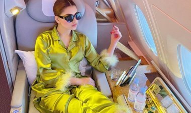 Urvashi Rautela takes luxury to her first class while grooving to Jack Harlow's music in satin green loungewear