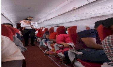 Air India Staff Calms Down A Crying Child In Flight, This Viral Video Will Touch The Heart