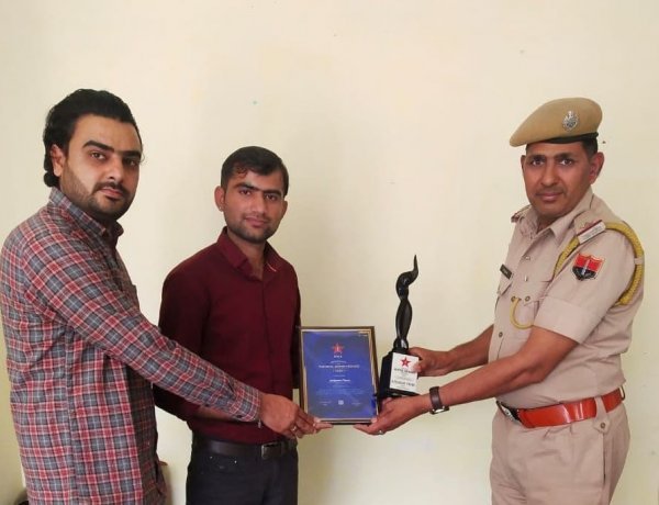 Corona Warrior Junjaram Thory honored with The Real Super Hero Awards Trophy