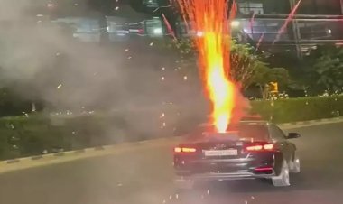 Fireworks over a moving car in Delhi: Youths burst firecrackers one after the other