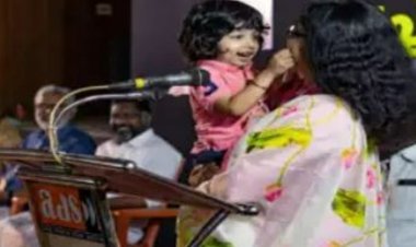 Women IAS in Kerala trolled on social media over giving a speech with son in lap