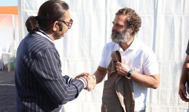Celebrity fashion designer Himmat Singh presented Khadi designer Nehru jacket to Rahul Gandhi