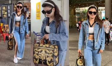 Urvashi Rautela Stuns in High-Fashion Denim Ensemble Paired with a Lavish Tote Bag at Mumbai Airport