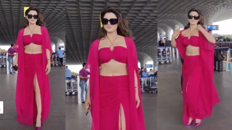 Urvashi Rautela Makes a Striking Entrance at Mumbai Airport in Mesmerizing Magenta-Pink Attire