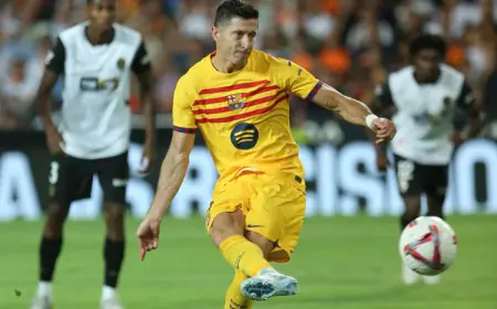 Barcelona beat Valencia 2-1 to register its first win of the Spanish La Liga season