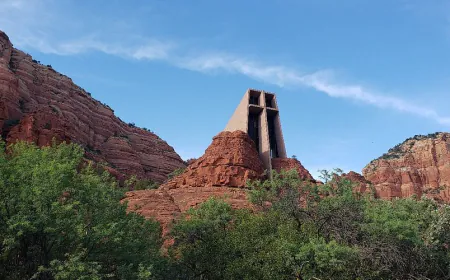 Place of prayer in USA surrounded by red rocks on a high mountain, Chapel of the Holy Cross's history is linked to World War-II
