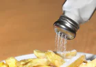 Sprinkling Extra Salt on Food? These Signs Show You’re Eating Too Much Sodium